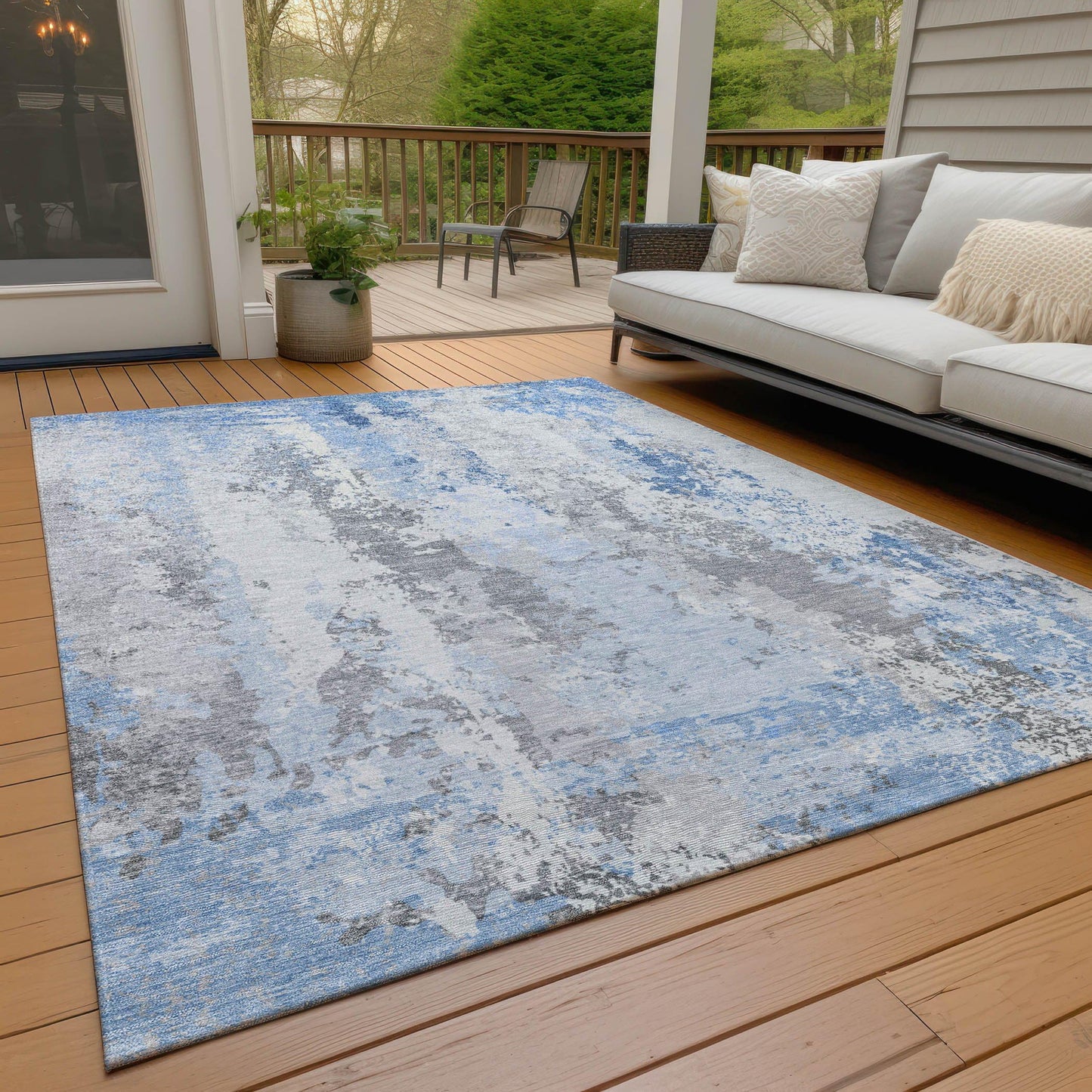 5' X 8' Sky Blue and Ivory Abstract Washable Indoor Outdoor Area Rug
