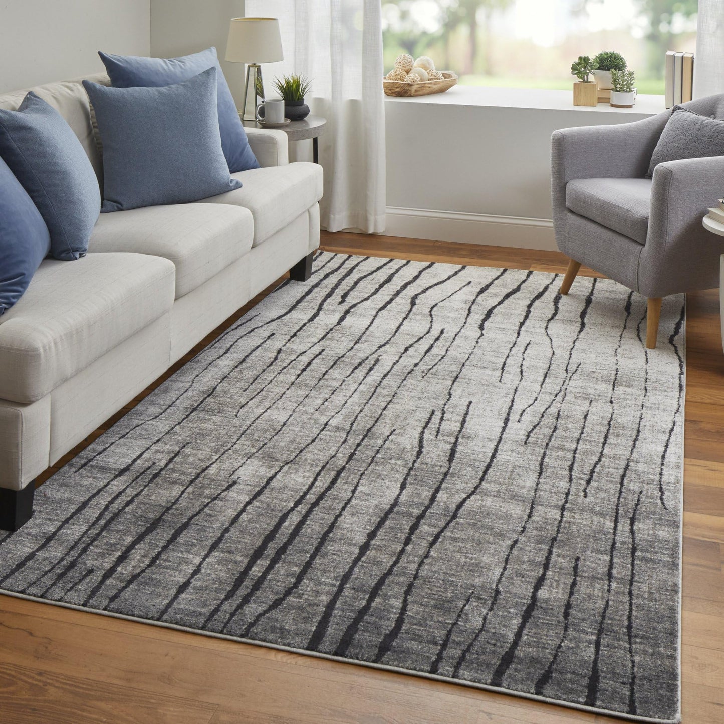5' X 8' Gray and Black Abstract Power Loom Area Rug