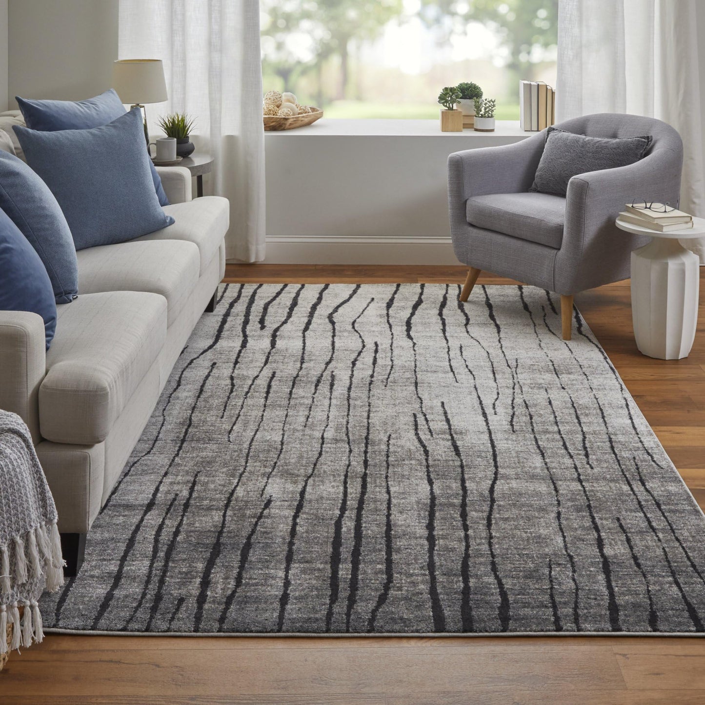 5' X 8' Gray and Black Abstract Power Loom Area Rug