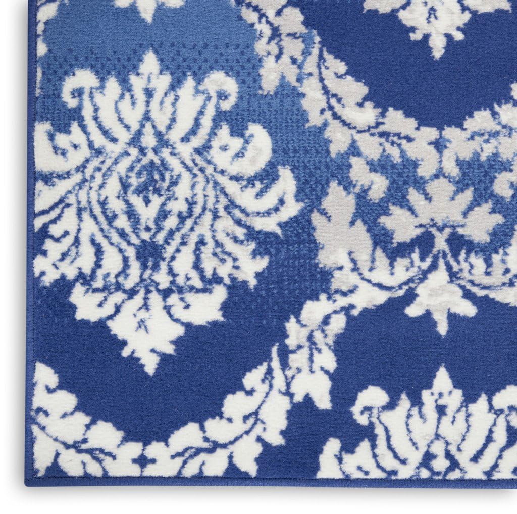 7' X 10' Ivory and Blue Damask Distressed Non Skid Area Rug